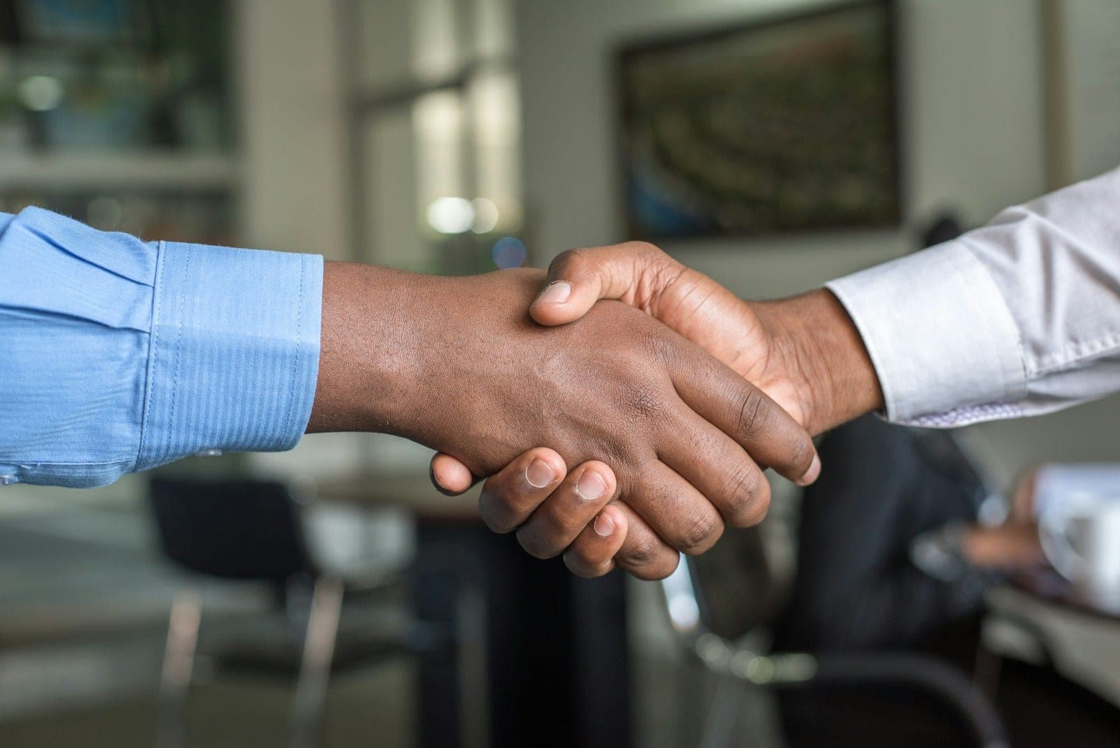 Business partners meeting to coordinate United States supply